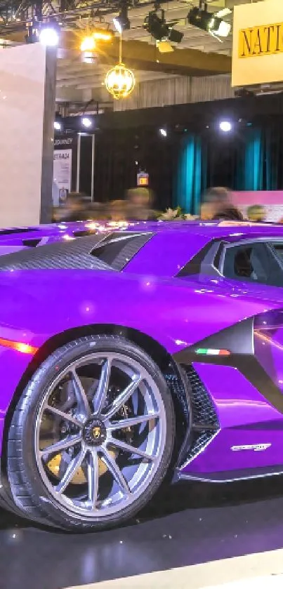 Vibrant purple supercar showcased at a car exhibition with luxurious details.