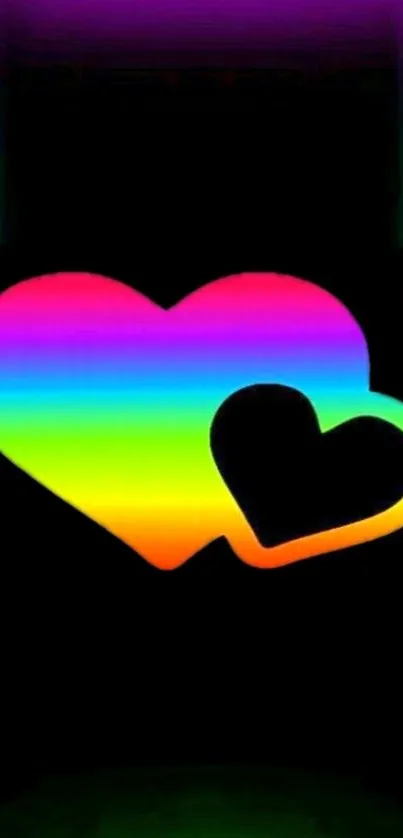 Vibrant rainbow heart wallpaper with black background and colorful gradient hearts.