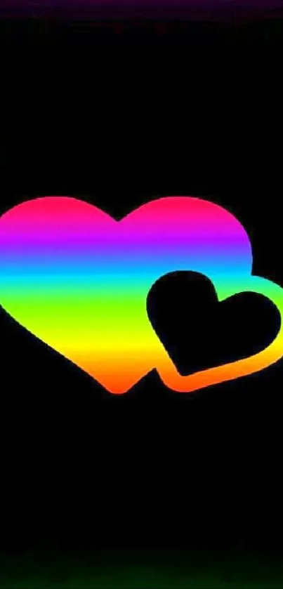 Colorful rainbow heart on black background wallpaper.