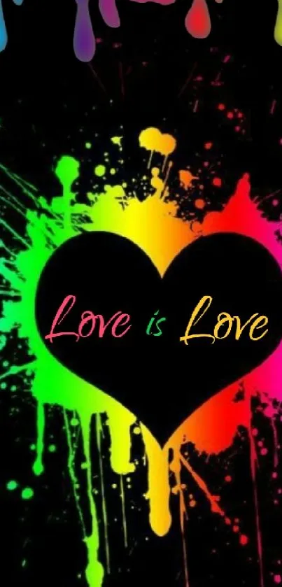 Colorful rainbow heart with paint splashes on black background.