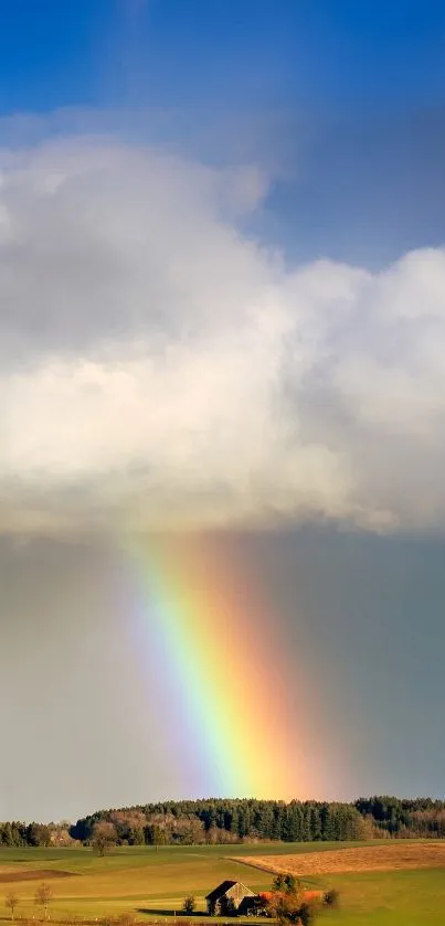 Colorful rainbow over a serene countryside landscape.