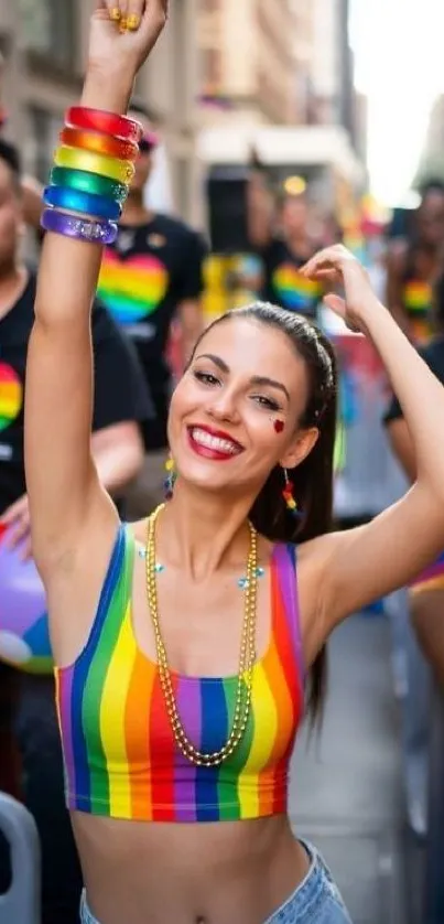 Joyful person in rainbow attire celebrating at a pride parade.