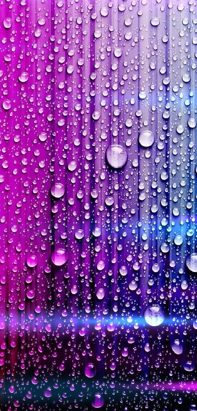 Vibrant gradient wallpaper with raindrop effect in pink, purple, and blue hues.