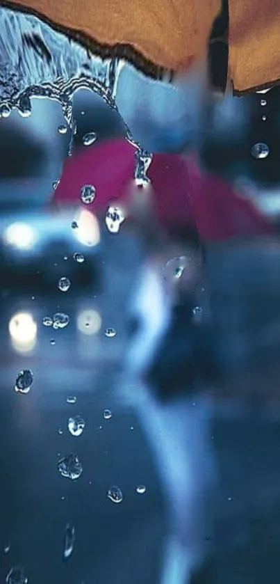 Raindrop-covered umbrella with vibrant colors and blurred street background.