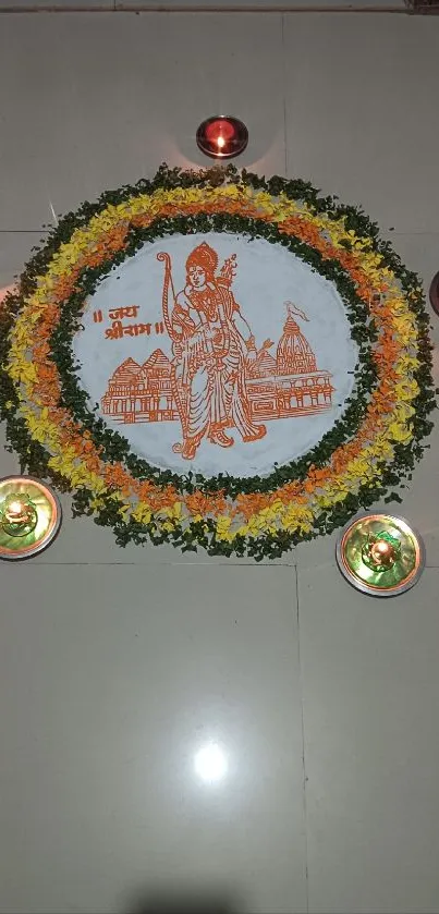 Traditional rangoli design with candles on a tiled floor.