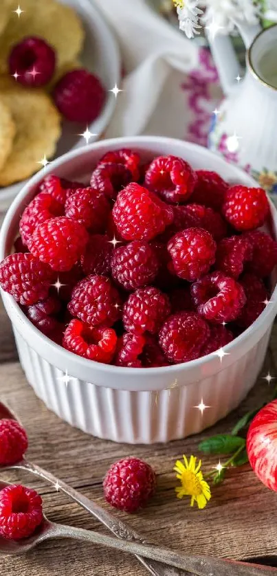 Vibrant raspberries in a bowl with apples and daisies on a rustic table.