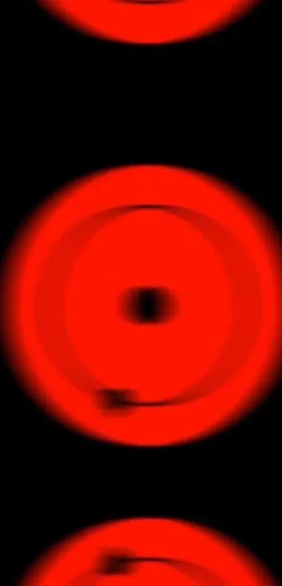 Vibrant red circles on a black background mobile wallpaper.