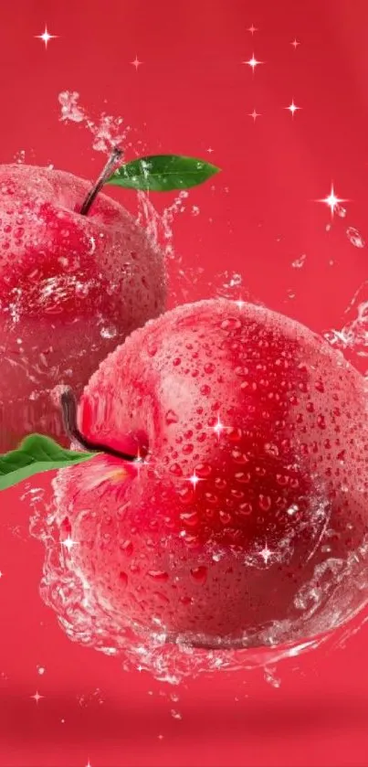 Red apples with water splash and droplets on a vibrant background.