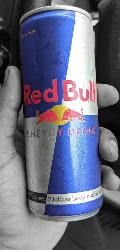 Vibrant and dynamic Red Bull can wallpaper with bold colors.