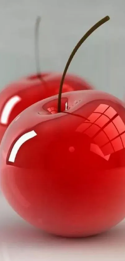 Shiny red cherries with reflective surface on wallpaper.