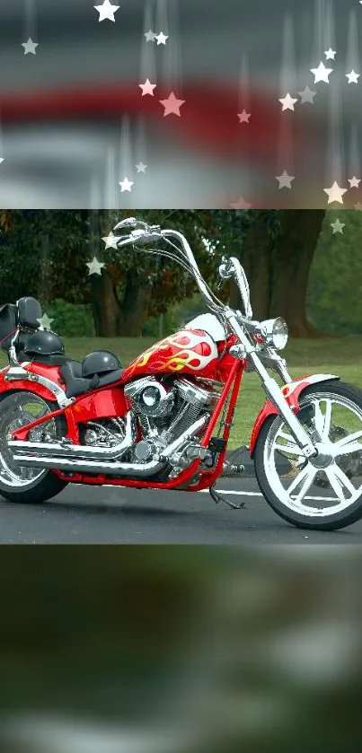 Red chopper motorcycle with chrome in a scenic park setting.