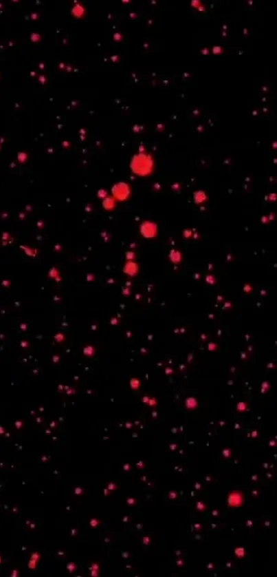 Dynamic red dots scattered on a black background wallpaper.