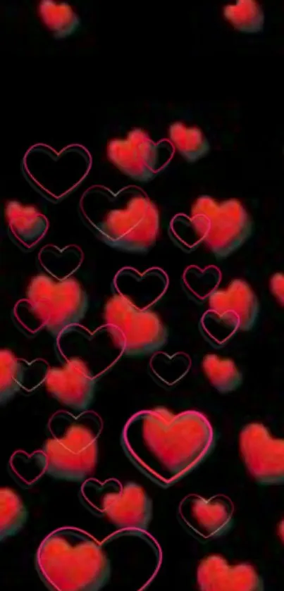 Red hearts on black background wallpaper.