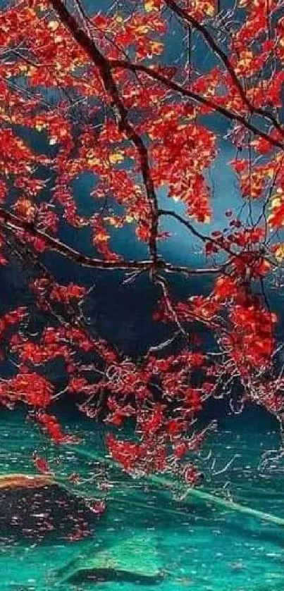 Red maple leaves over a tranquil blue lake.