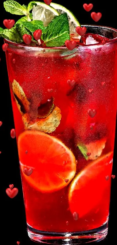 Refreshing red mojito with mint and citrus slices on a black background.