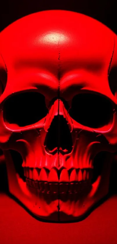 Vibrant red skull mobile wallpaper with bold design.