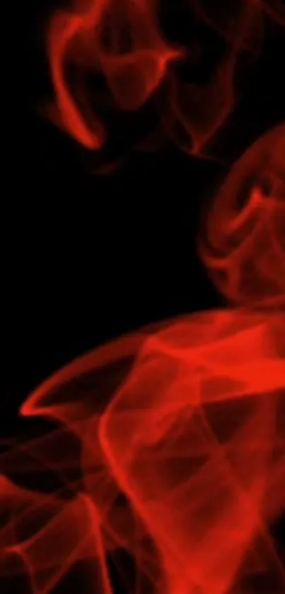 Abstract red smoke on black background wallpaper.