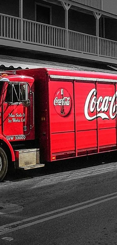 Vibrant red truck in an urban setting.