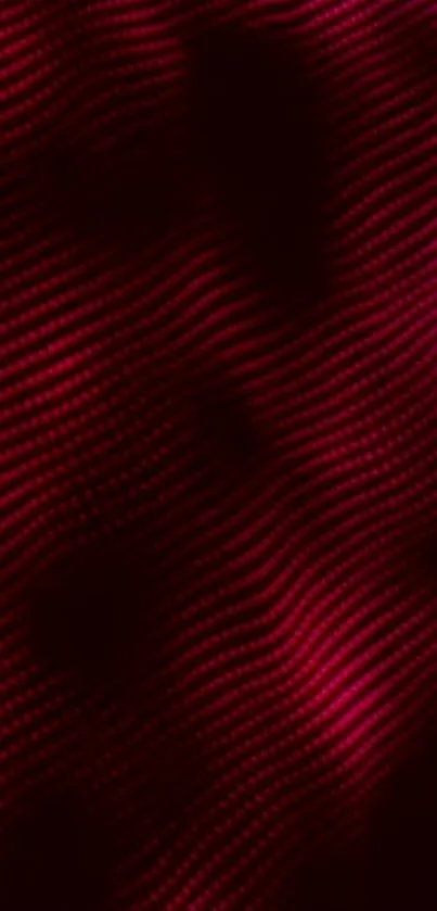 Vibrant red wave pattern wallpaper with dynamic texture.