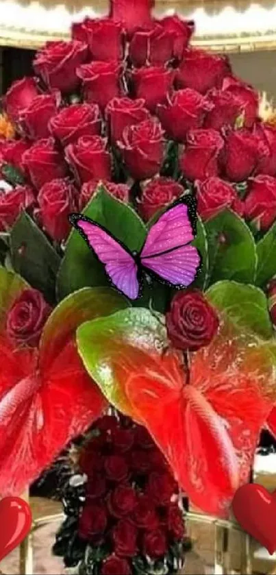 Vibrant red roses with a pink butterfly on a decorative display.