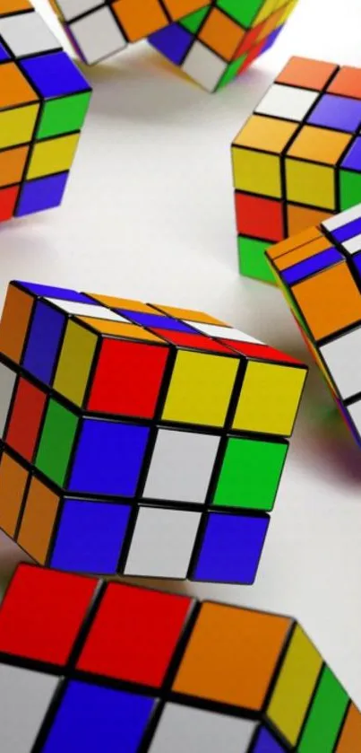 Colorful Rubik's cubes on white background.