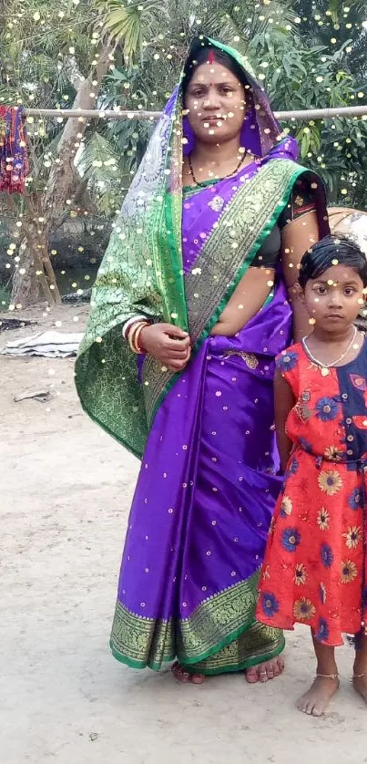 Colorful rural saree fashion in a village setting.