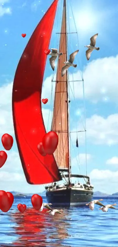 Red sailboat with hearts and seagulls on the ocean under a blue sky.