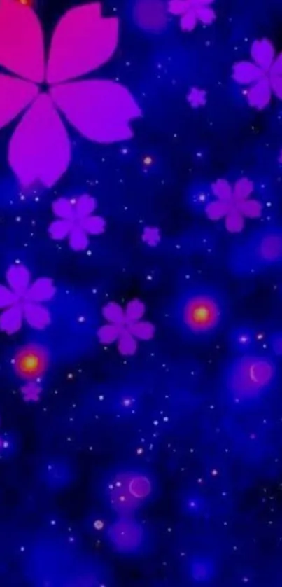 Vibrant pink sakura blossoms on a deep blue starry night background.