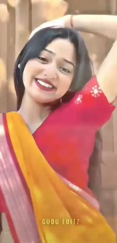 Smiling woman in vibrant sari, mobile wallpaper.