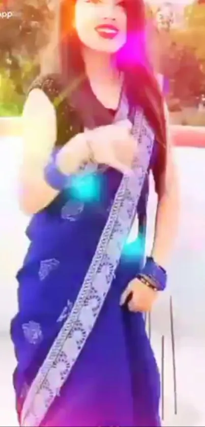 Woman in vibrant blue sari with colorful lights.