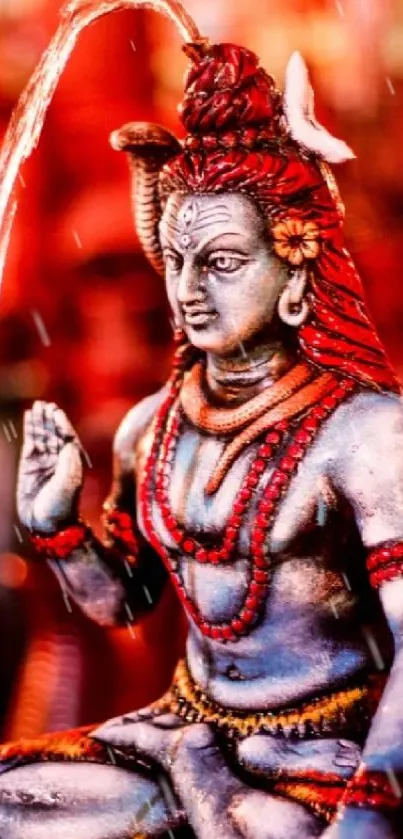 Colorful Shiva statue with red background and intricate details.