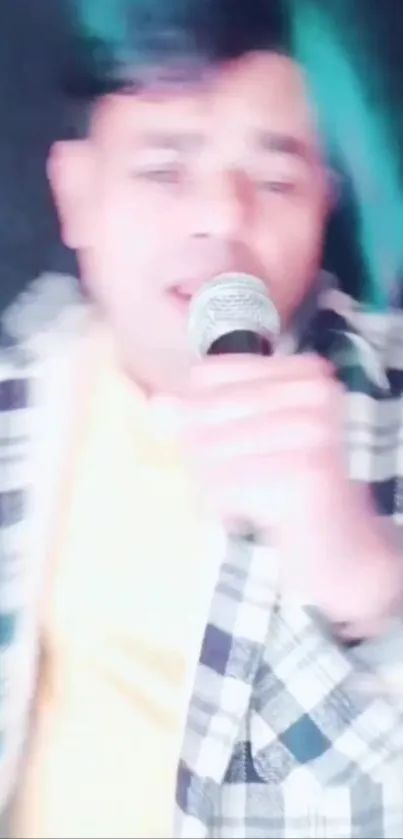 Blurry portrait of a singer with a microphone.