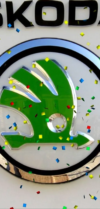 Green Skoda logo with colorful confetti.