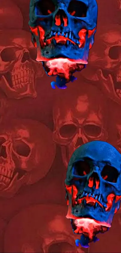 Vibrant artistic wallpaper with blue and red skulls on a dark background.