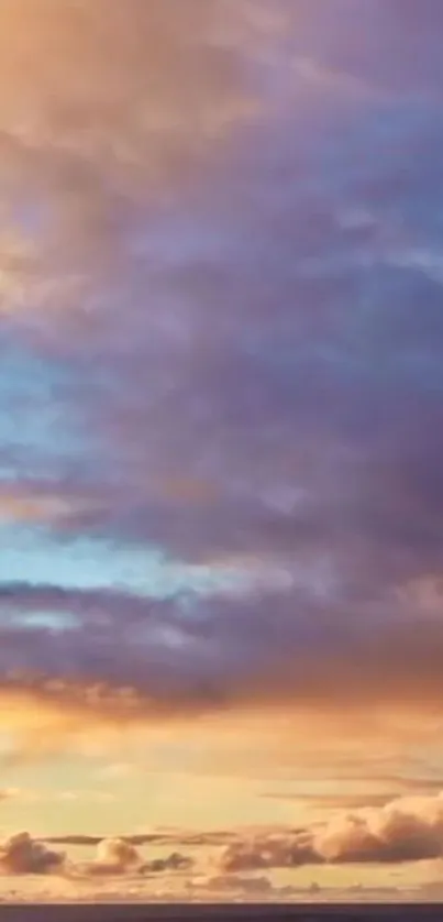 Colorful sky with orange and purple clouds during sunset.