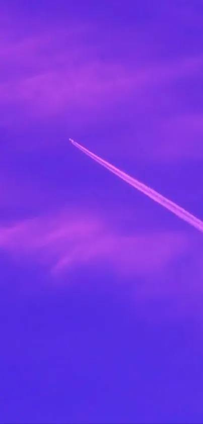 Jet trail across a vibrant purple sky wallpaper.