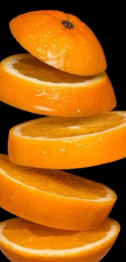 Floating slices of vibrant orange against a black backdrop.