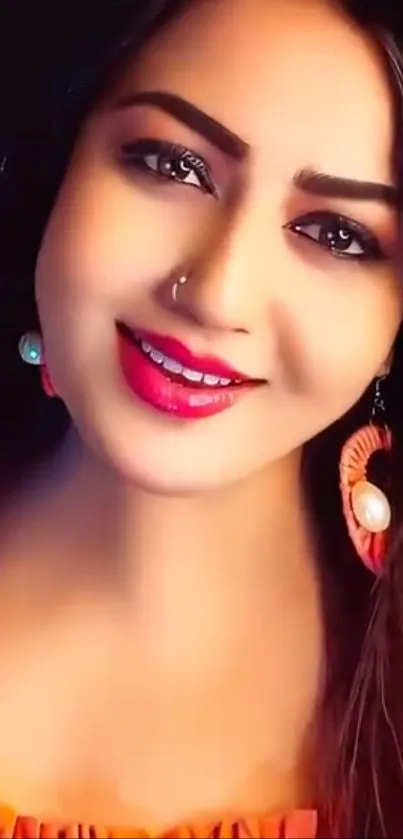 Smiling woman with colorful earrings and bright makeup.
