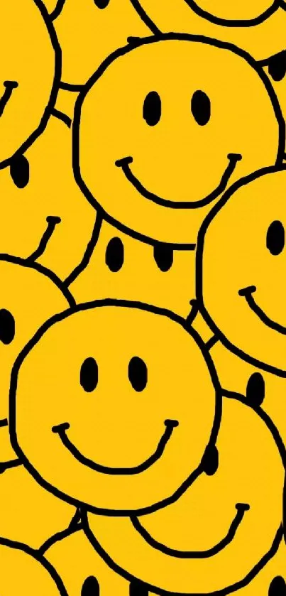 Vibrant yellow smiley faces on a cheerful wallpaper design.