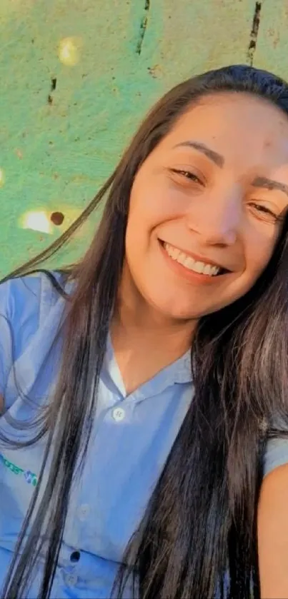 Smiling woman with long hair in sunlight