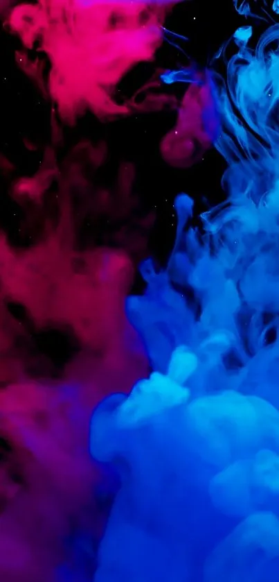 Vibrant smoke in pink and blue hues creating an abstract art effect.