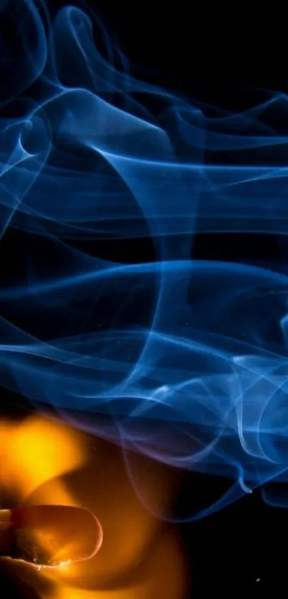 Blue smoke and orange flame on a dark background wallpaper.