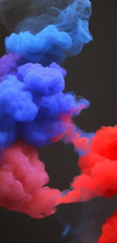 Colorful smoke clouds in red and blue against a dark background.