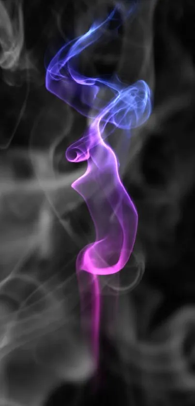 Vibrant purple and blue smoke on a black background.