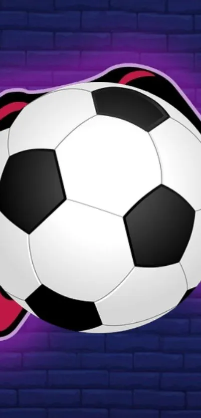 Soccer ball with a vibrant purple glow against a brick wall background.