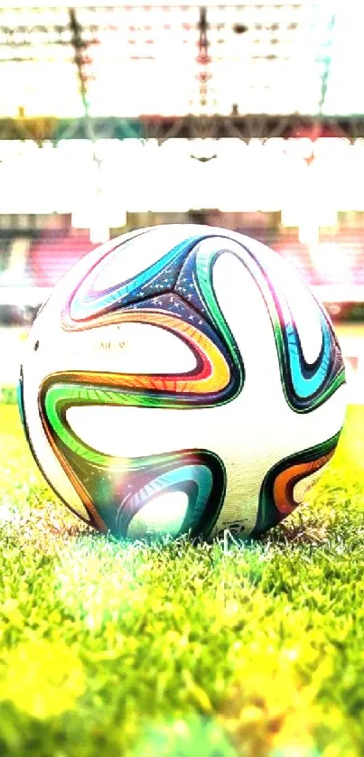 Colorful soccer ball on a vibrant stadium field, ideal for sports lovers.