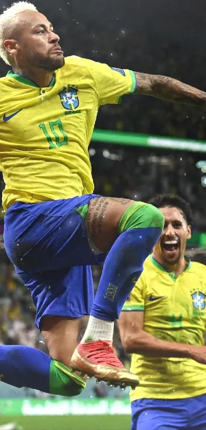 Soccer player in yellow jersey leaping in celebration on a vibrant field.