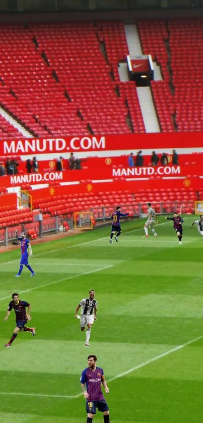 Soccer players in action in a red stadium.