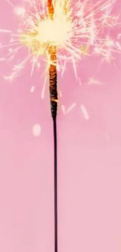 Mobile wallpaper featuring a sparkler on a pink background.