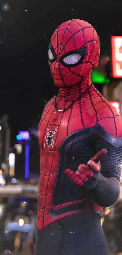 Spider-themed superhero in red costume against urban night backdrop.